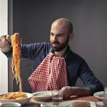 Man eating pasta